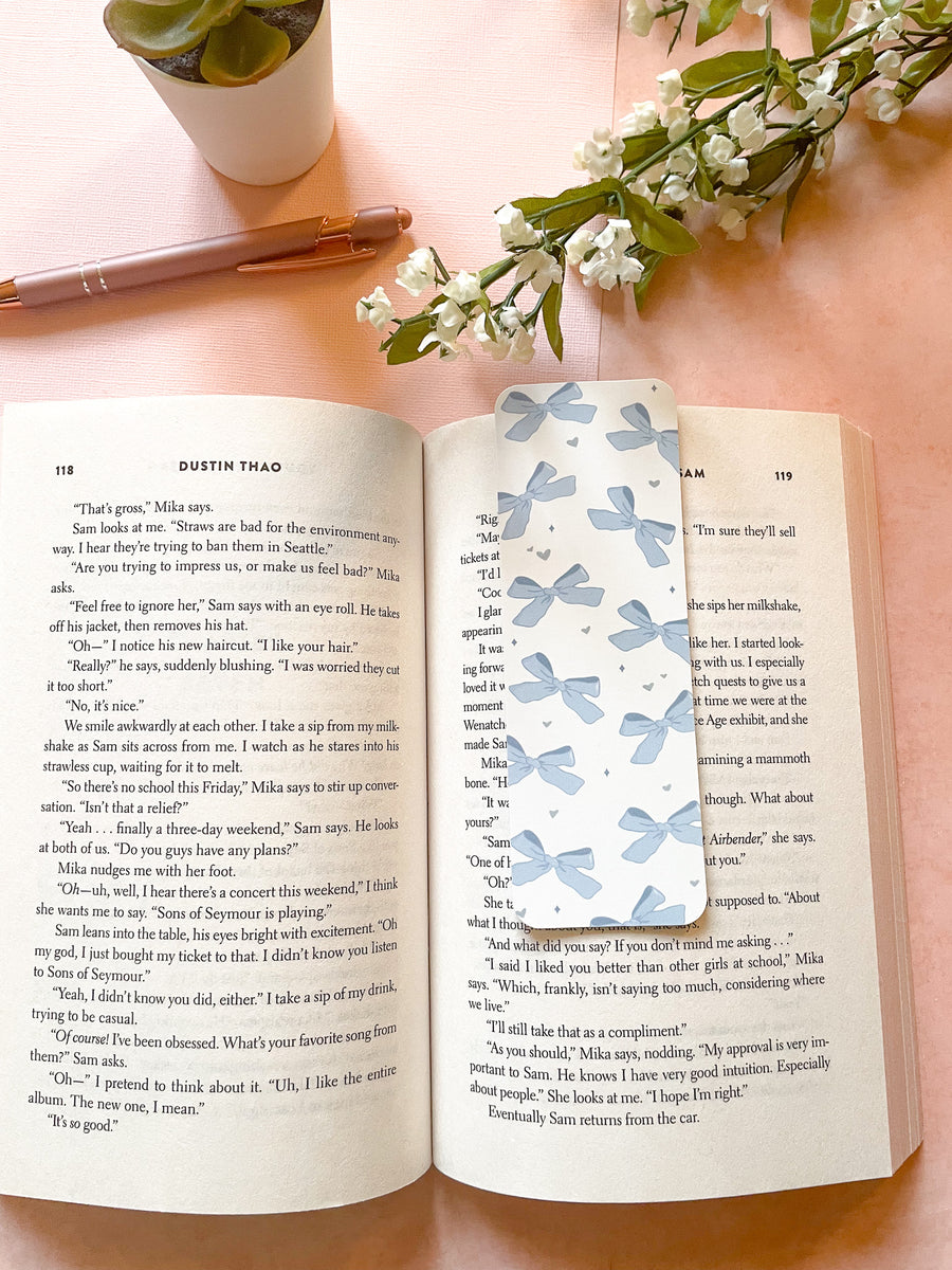 girly vintage styled bookmark with lots of blue bows in a pattern for reading books for girls, all blue coquette and feminine
