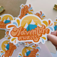 Adventure awaits camping sticker. Matte sticker. Orange and blue camping sticker